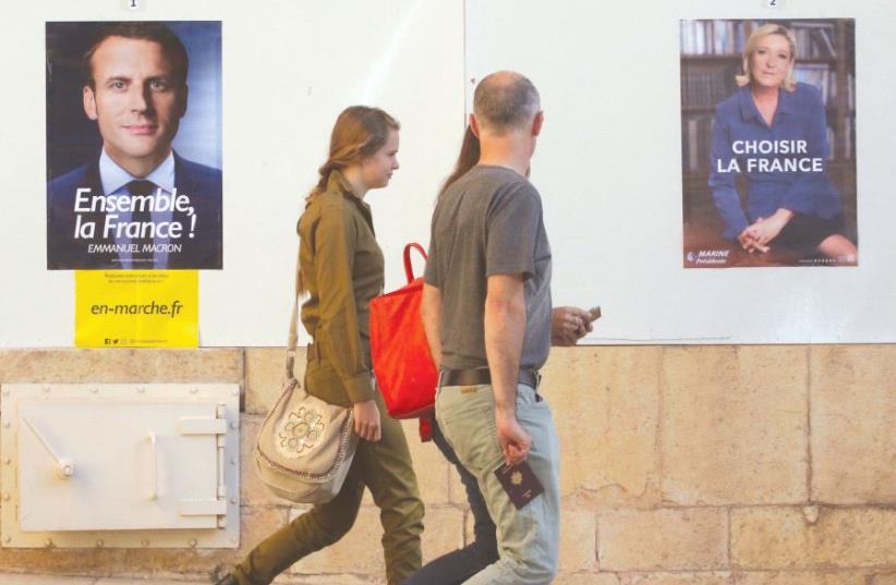PEOPLE HEAD to a polling station in the French consulate in Jerusalem to vote in the presidential elections. (photo credit: MARC ISRAEL SELLEM)