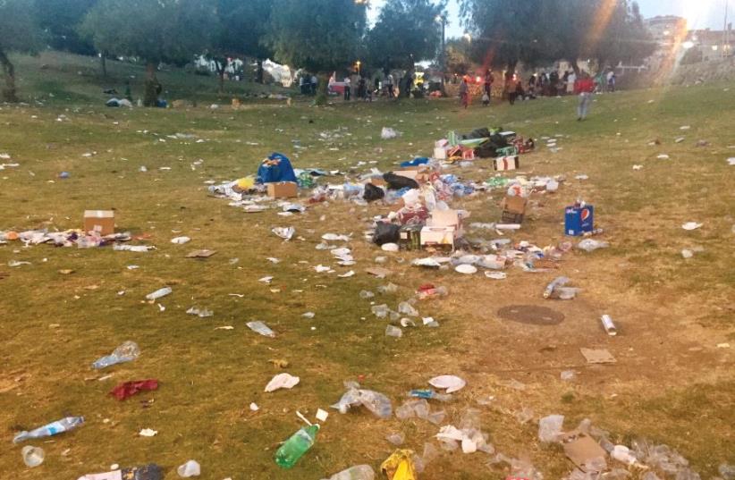 The aftermath: Sacher Park after the Independence Day festivities on May 2 (photo credit: YAAKOV FAUCI)