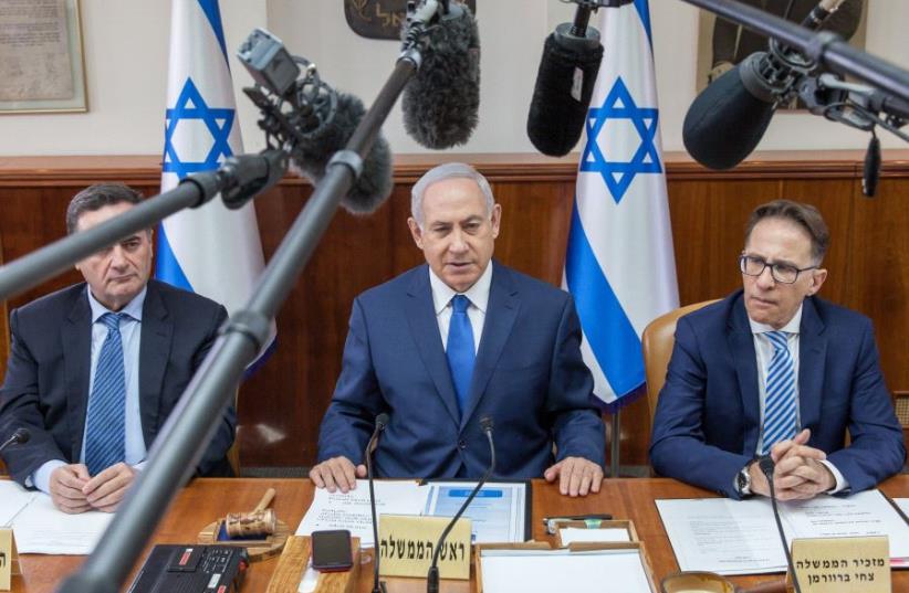 Israeli Prime Minister Benjamin Netanyahu chairs the weekly cabinet meeting in Jerusalem May 21, 2017. (photo credit: EMIL SALMAN/POOL)