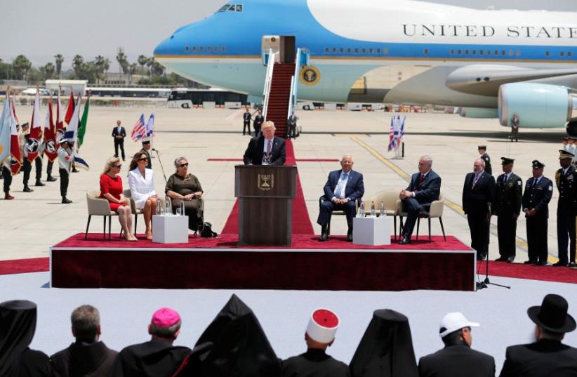 US President Donald Trump (C) speaks during a welcoming ceremony upon his arrival at Ben Gurion International Airport in Lod near Tel Aviv, Israel May 22, 2017 (photo credit: REUTERS)