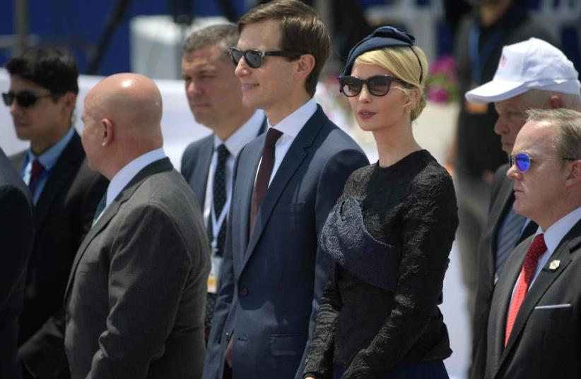 White House senior advisor Jared Kushner (C) and Ivanka Trump (2R), the daughter of US President take part in a welcome ceremony upon the US President's arrival at Ben Gurion International Airport in Tel Aviv on May 22, 2017, as part of his first trip overseas (photo credit: MANDEL NGAN / AFP)
