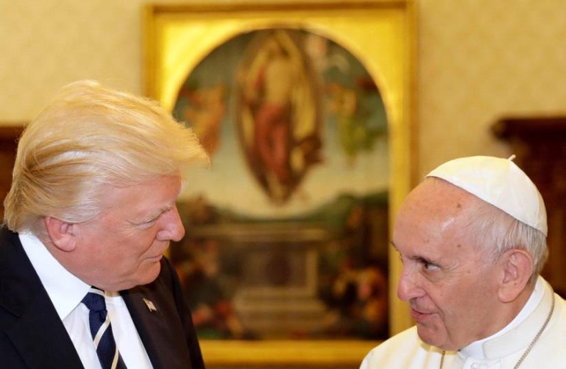 Pope Francis talks with US President Donald Trump during a private audience at the Vatican, May 24, 2017 (photo credit: REUTERS)