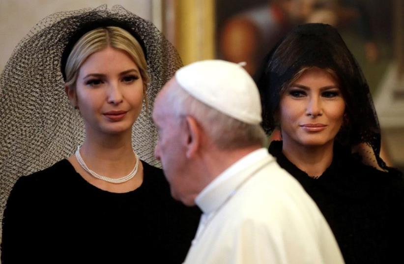 Pope Francis walks past Ivanka Trump (L) and First Lady Melania Trump during a private audience at the Vatican, May 24, 2017 (photo credit: REUTERS)