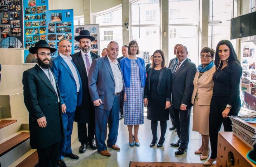 Estonian President Kersti Kaljulaid (center) pictured with other dignataries in the celebration of the 10th Anniversary for the establishment of the first Jewish community center built in Estonia since the Holocaust, May 25 2017. (photo credit: ELENA RUDI)