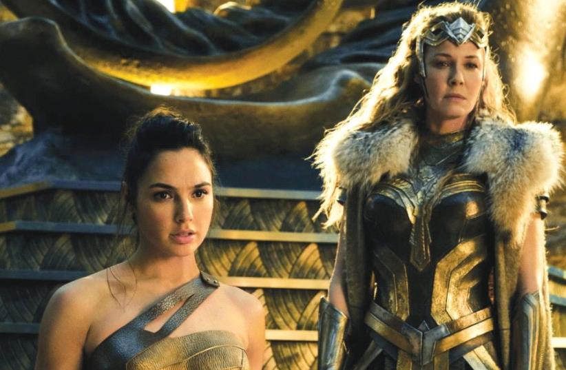 GAL GADOT (left) and Connie Nielsen in a scene from ‘Wonder Woman.’ (photo credit: DC COMICS)