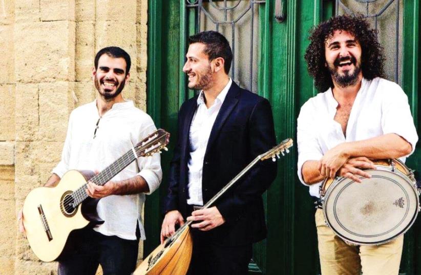 Trio Drumbouki, left to right: guitarist Dudi Shaul, bouzouki player George and drummer Petros Kkallis (photo credit: SAVVAS MILTIADOUS)