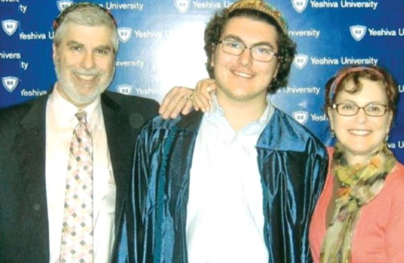 MARK AND ELLEN NEWMAN with Ariel at his high-school graduation a few months before his death. (photo credit: Courtesy)