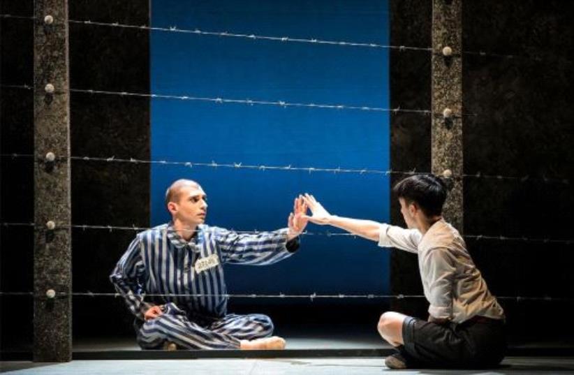 DANCERS MATTHEW Koon as Bruno and Filippo Di Vilio as Shmuel in the ballet adaptation of 'The Boy in the Striped Pajamas.' (photo credit: EMMA KAULDHAR)