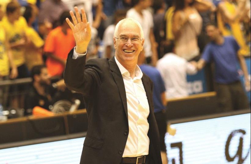 Arik Shivek seems to be enjoying every moment at Maccabi Tel Aviv despite knowing that he is unlikely to remain its head coach even should he guide the yellow-and-blue to the BSL title.  (photo credit: ADI AVISHAI)