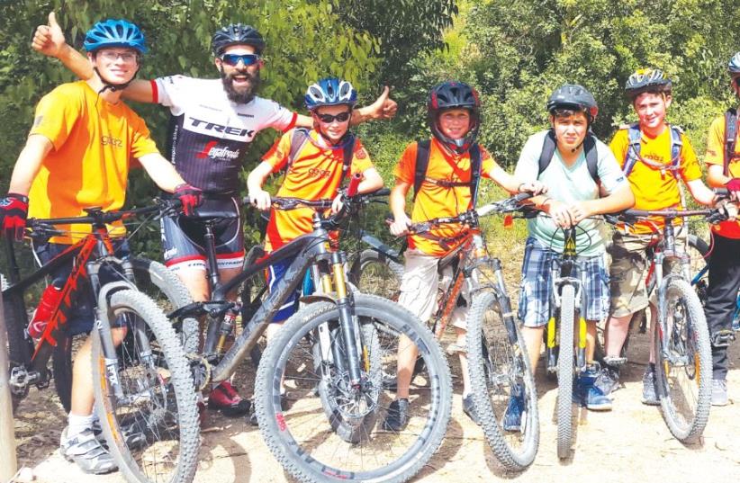 The program’s most advanced group at Single Zacharia – a 14-km. bike trail that Geerz riders built with their own hands (photo credit: GEERZ)