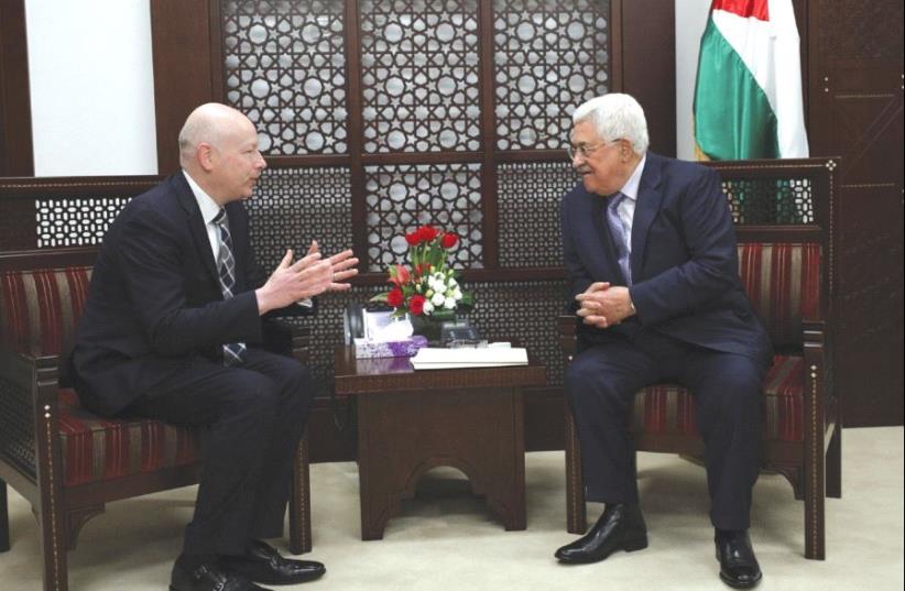 PALESTINIAN AUTHORITY President Mahmoud Abbas meets with Jason Greenblatt, US President Donald Trump’s Middle East envoy, in Ramallah. (photo credit: REUTERS)