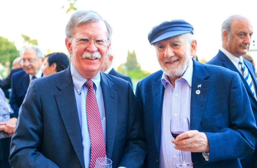 Walter Bingham poses with former US ambassador to the UN John Bolton, whom he has interviewed on his radio program (photo credit: Courtesy)