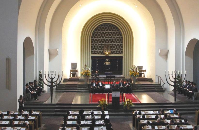 GENERAL view of the interior of the Roonstrasse Synagogue in Cologne, Germany. The author notes that Jews from Central Europe who abandoned their faith out of embarrassment illustrate a dynamic we still see today (photo credit: REUTERS)