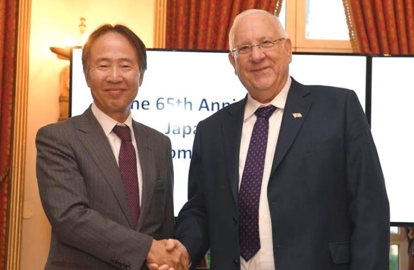 JAPANESE AMBASSADOR Koji Tomito and President Reuven Rivlin meet at the capital’s King David Hotel. (photo credit: GPO)