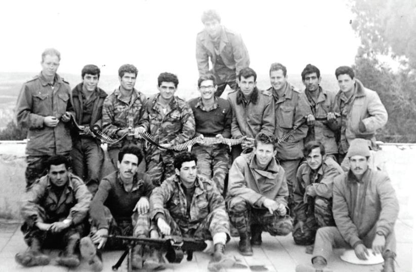 Soldiers of the 55th Paratrooper Brigade pause from training for a photo at Beit Guvrin in 1965 (photo credit: COURTESY DAN SHILOAH ARCHIVE)