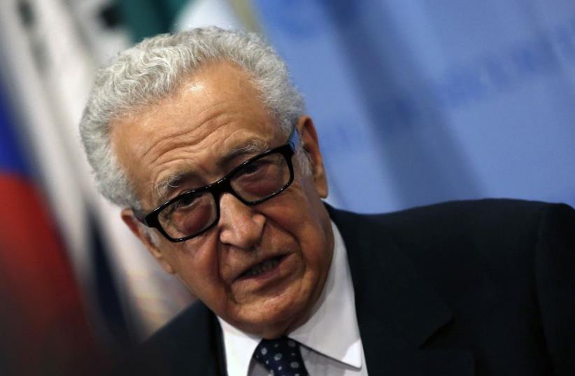 Former United Nations Special Envoy Lakhdar Brahimi talks to the media after briefing a United Nations Security Council meeting on Syria at U.N. headquarters in New York, March 13, 2014. (photo credit: REUTERS/MIKE SEGAR)