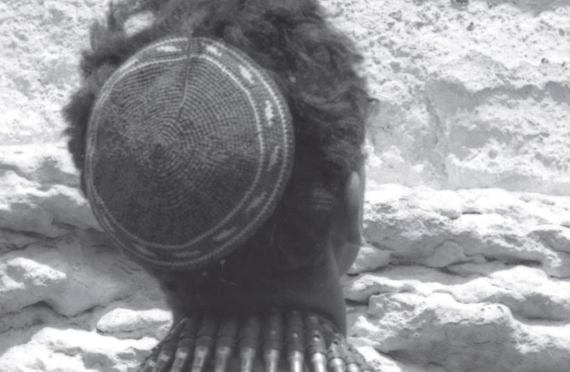 A soldier at the Western Wall during the Six Day War (photo credit: MICHA BAR-AM)
