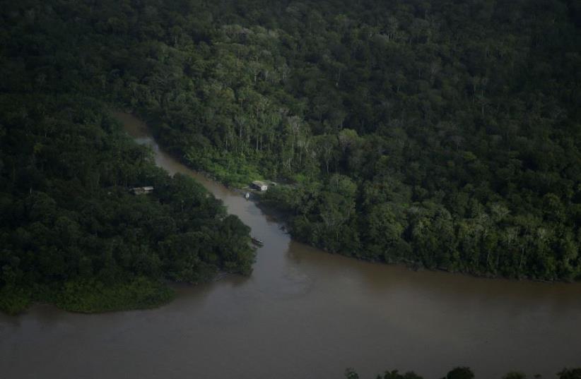 The Amazonas River on the coast of Amapa state (photo credit: REUTERS/RICARDO MORAES)