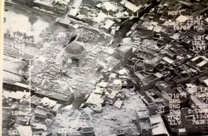 A still image taken from video shows the destroyed Grand al-Nuri Mosque of Mosul in Iraq, June 21, 2017 (photo credit: IRAQI MILITARY HANDOUT/VIA REUTERS TV)