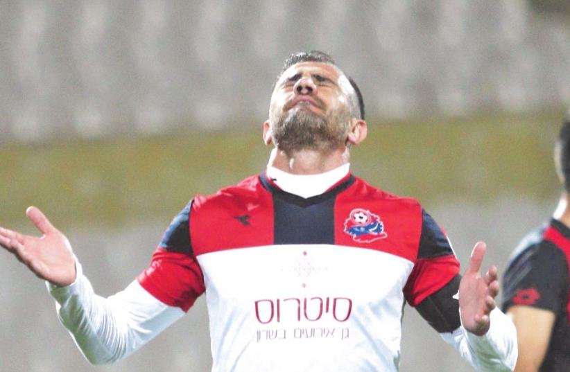 Hapoel Haifa striker Maharan Lala is in danger of being handed a substantial suspension after testing positive for a banned substance (photo credit: ADI AVISHAI)