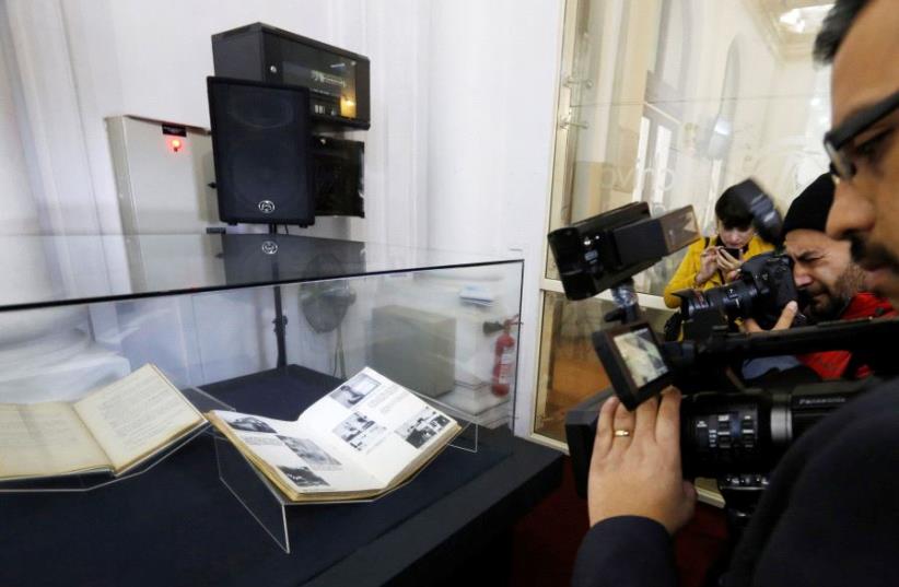 Books of Chile's Civil Police with declassified files relating to Nazi espionage (photo credit: REUTERS/CARLOS VERA)