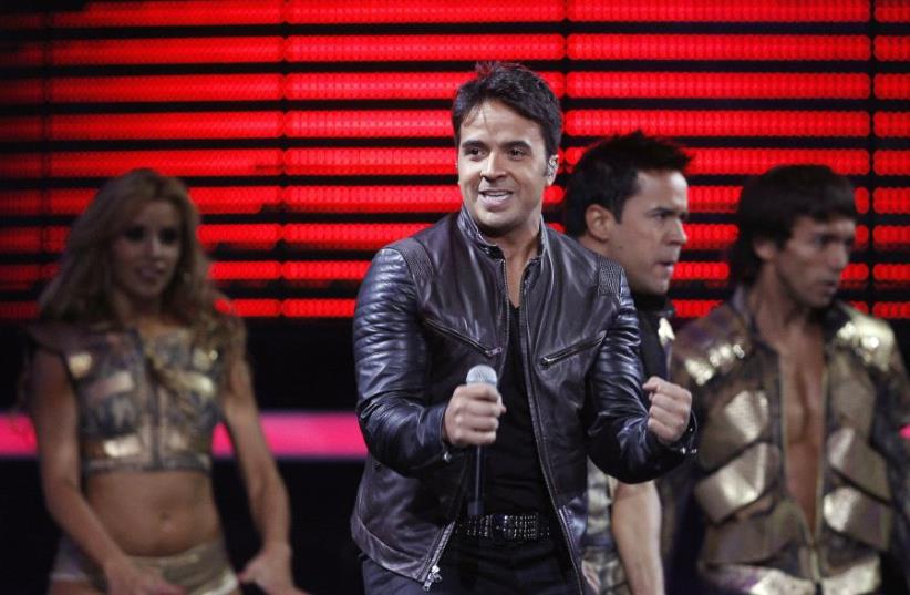 Puerto Rican singer and composer Luis Fonsi performs during the International Song Festival in Vina del Mar city, about 121 km (75 miles) northwest of Santiago, (photo credit: REUTERS)