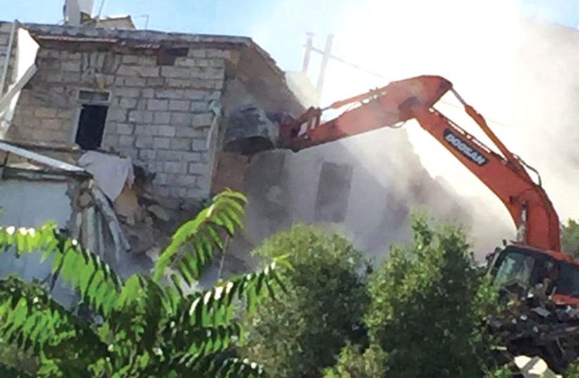 A house in Lifta is demolished last Thursday to make way for Highway 1 (photo credit: YONI YOCHANAN)