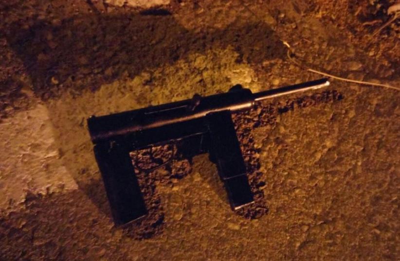 Makeshift automatic weapon at the scene of a weapons raid in Hebron (photo credit: IDF SPOKESMAN’S UNIT)