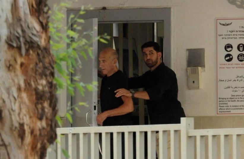 FORMER PRIME MINISTER Ehud Olmert being released from prison (photo credit: AVSHALOM SASSONI)