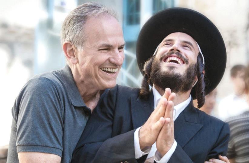 AVI NESHER appears with actors Natan Goshen and Joy Rieger on the set of his upcoming film ‘Pilgrim’ (photo credit: MICHAL FATTAL)