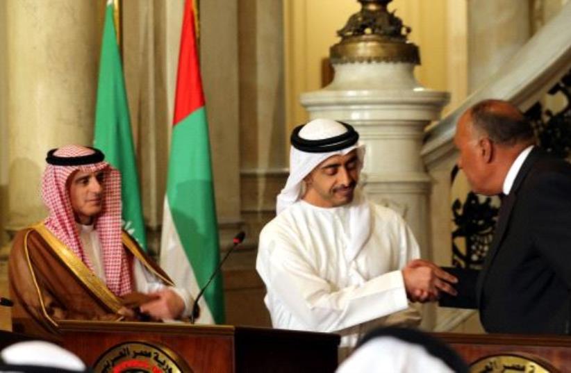 Saudi Foreign Minister Adel al-Jubeir, UAE Foreign Minister Abdullah bin Zayed al-Nahyan and Egyptian Foreign Minister Sameh Shoukry attend a press conference after their meeting that discussed the diplomatic situation with Qatar, in Cairo, Egypt July 5, 2017.  (photo credit: REUTERS/KHALED ELFIQI/POOL)