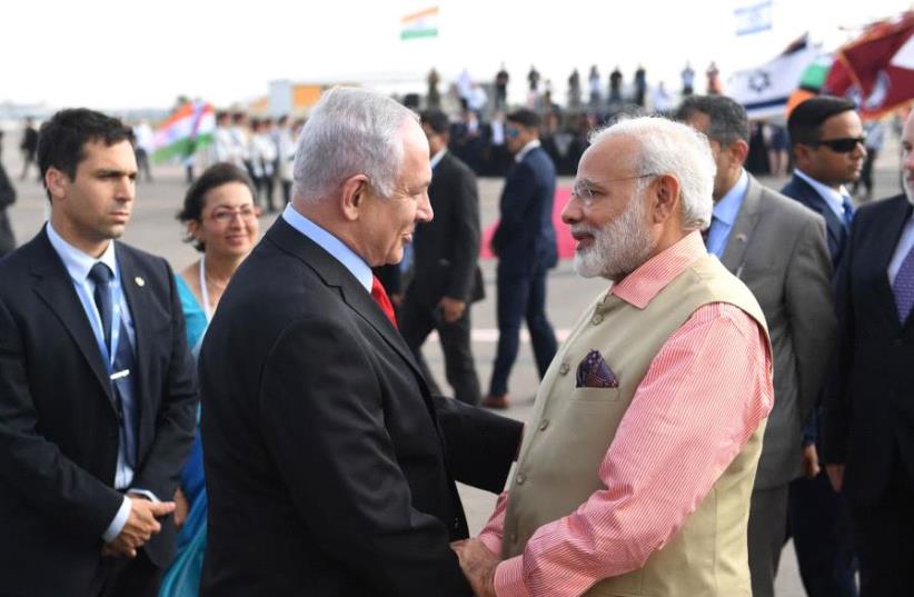 Visiting Indian Prime Minister Narendra Modi with Israeli Prime Minister Benjamin Netanyahu at Ben-Gurion airport before his departure after an historic three day visit to Israel (photo credit: KOBI GIDEON/GPO)