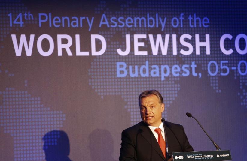 Hungarian Prime Minister Viktor Orban delivers a speech during the 14th Plenary Assembly of the World Jewish Congress in Budapest May 5, 2013 (photo credit: LASZLO BALOGH/REUTERS)