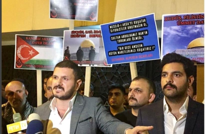 Kürşat Mican, one of the demonstrators, speaks to reporters about the group's intent to continue protesting.  (photo credit: KÜRŞAT MICAN/INSTAGRAM)