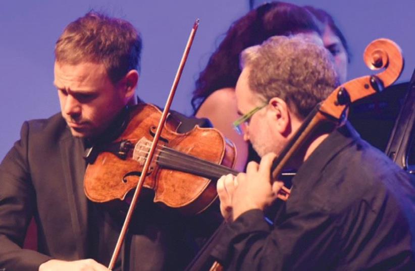 VOICE OF Music Festival artistic director and cellist Zvi Plesser (right) performs with viola player Amihai Grosz. (photo credit: GALILEE REGIONAL COUNCIL SPOKESPERSON’S OFFICE)