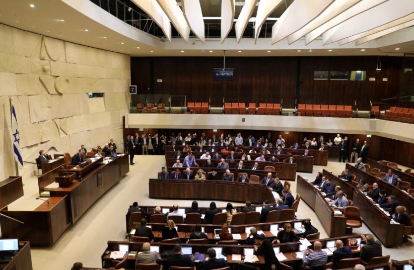 sraeli lawmakers attend a vote on a bill at the Knesset, the Israeli parliament, in Jerusalem February 6, 2017 (photo credit: AMMAR AWAD / REUTERS)