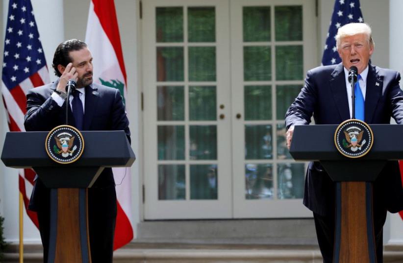 US President Donald Trump speaks during a press conference with Lebanese Prime Minister Saad al-Hariri in the Rose Garden of the White House in Washington, US, July 25, 2017. (photo credit: REUTERS)