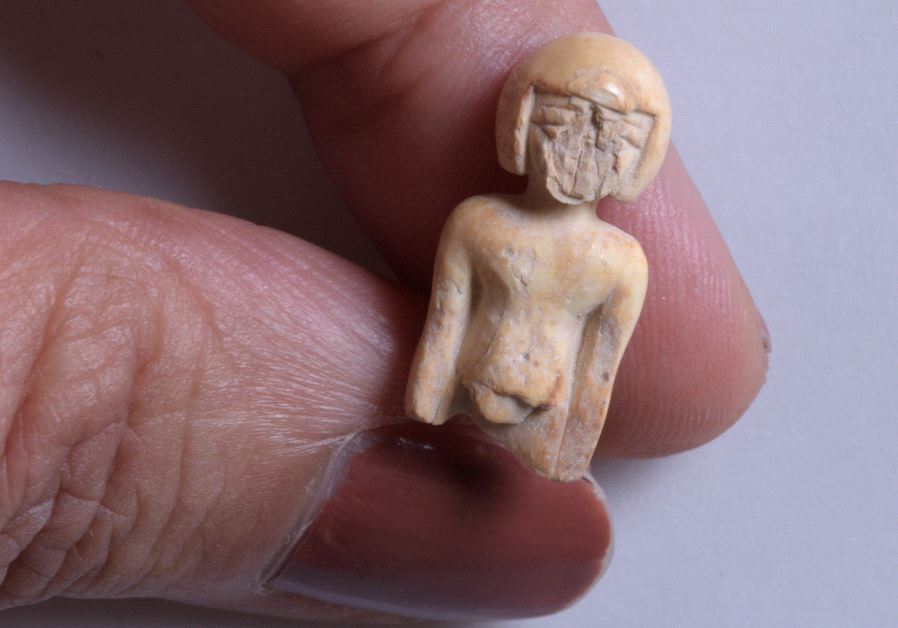  An ivory statue in the image of a woman (CLARA AMIT, COURTESY OF THE ISRAEL ANTIQUITIES AUTHORITY)