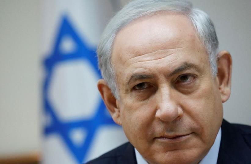 Israeli Prime Minister Benjamin Netanyahu attends the weekly cabinet meeting in Jerusalem July 30, 2017.  (photo credit: REUTERS)