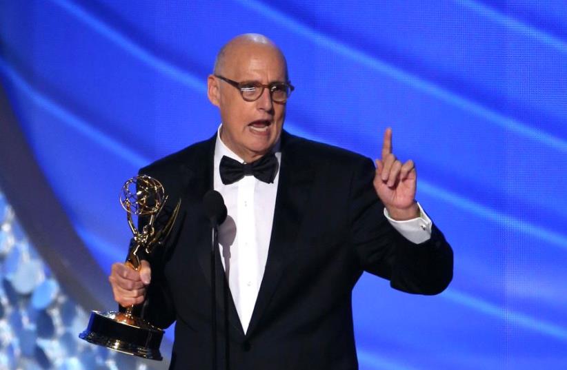 Jeffrey Tambor accepts the award for Outstanding Lead Actor In A Comedy Series for 'Transparent' (photo credit: REUTERS/MIKE BLAKE)