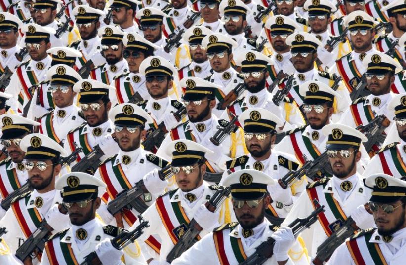 Members of the Iranian Revolutionary Guard Navy march during a parade to commemorate the anniversary of the Iran-Iraq war (1980-88), in Tehran September 22, 2011. (photo credit: REUTERS)