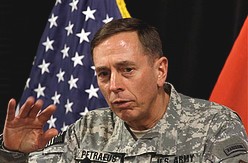 Command Sgt. Maj. Marvin Hill, center, points out a colleague to Gen. David Petraeus, left, the leading American general who oversees the wars in Iraq and Afghanistan, as Gen. Raymond Odierno, right, the top US commander in Iraq, looks on during a ceremony at al-Faw palace in Baghdad, Iraq.