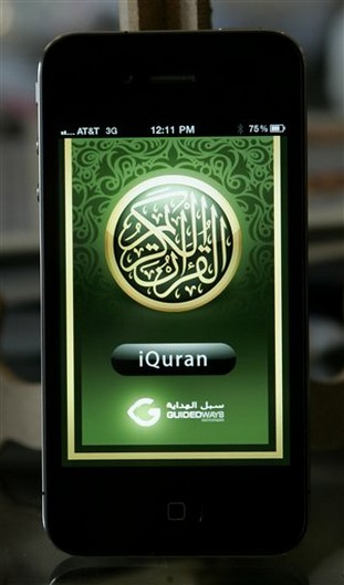 An IPhone displays an app called IQuran