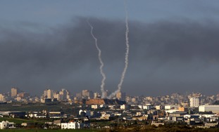 Smoke trails after rockets are fired in Gaza