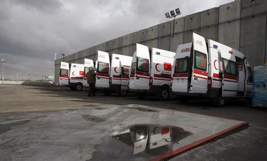 Palestinian Red Crescent ambulances [file] - By Baz Ratner / Reuters