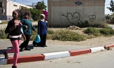 Women walking in the mixed Arab-Jewish city Lod 