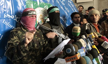 Masked Hamas men hold a press conference [file]