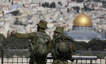 IDF soldiers view J'lem from Mt. of Olives - Photo: Darren Whiteside / Reuters