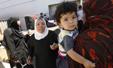 Palestinians returning from Egypt cross into Gaza 