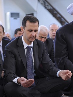 Syrian President Assad at Id al-Adha prayers (Reuters)